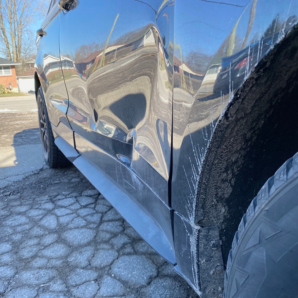 Car With A Severely Dented Panel