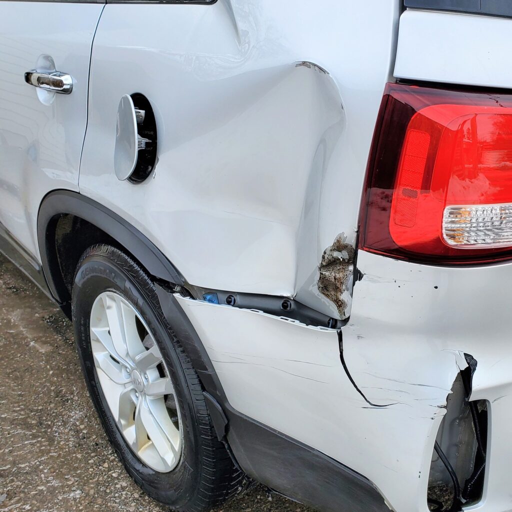A Severely Dented Vehicle After A Collision